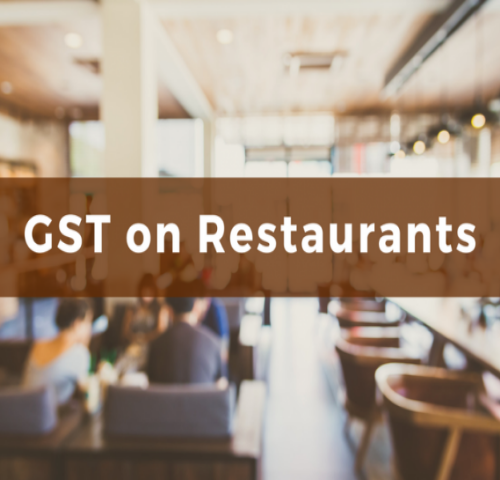 Image which Shows the text GST on Restaurents in a Restaurent Background.